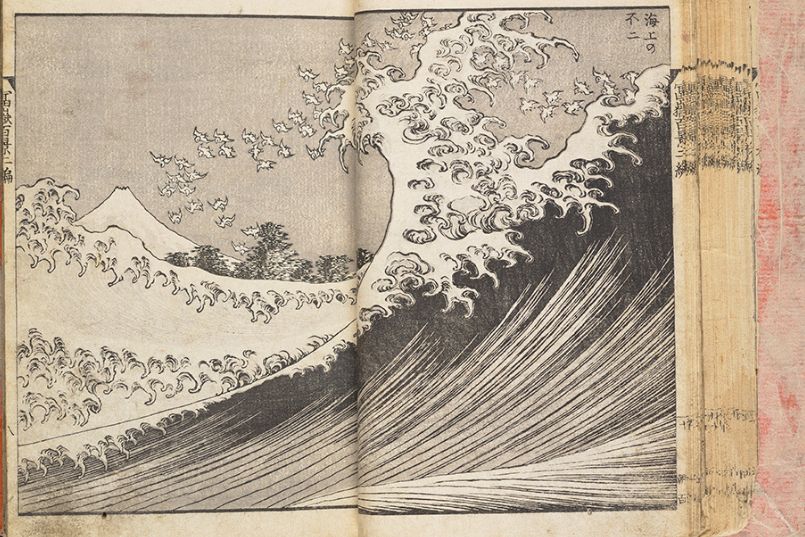 Woodblock print of a large wave with mountain in background