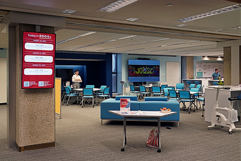 Couches, chairs, and tables in a large room