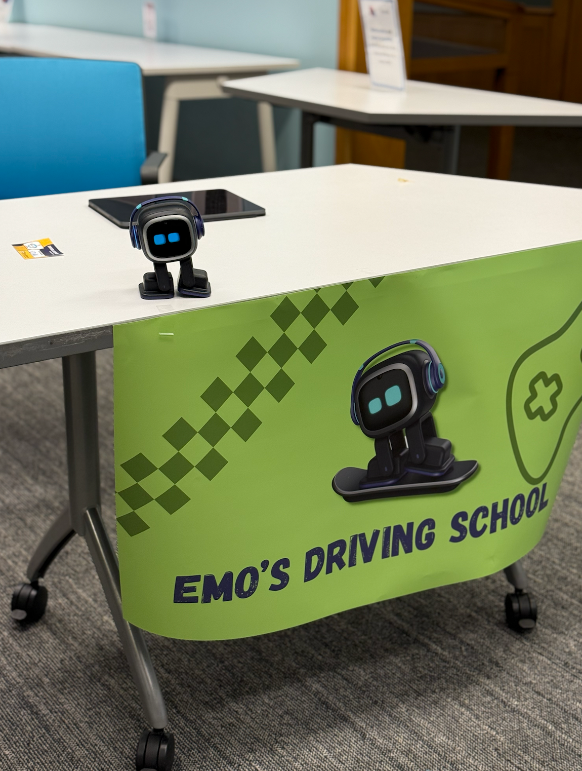 dancing robot - emo's driving schools
