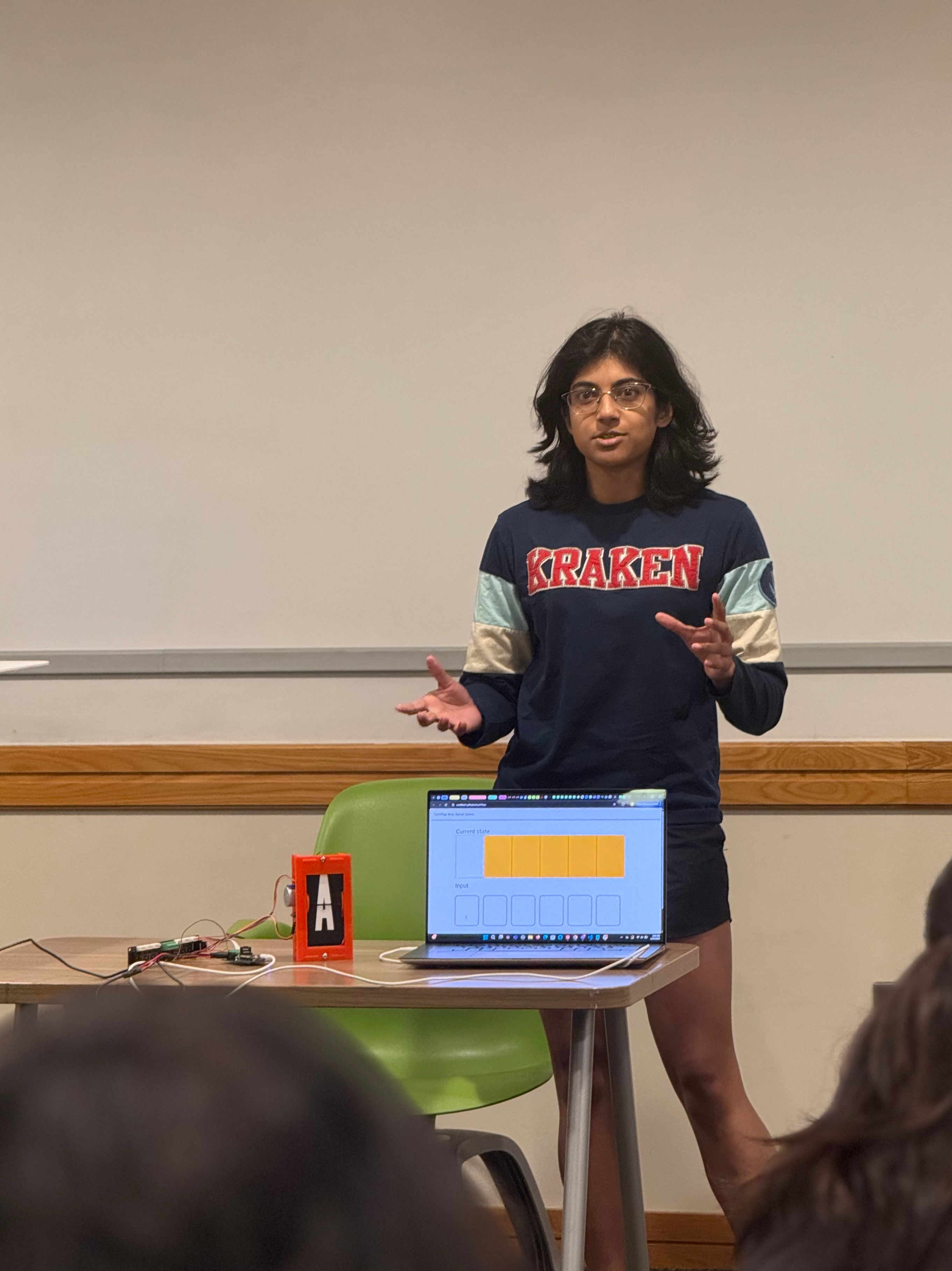 Riya with her flipping card design