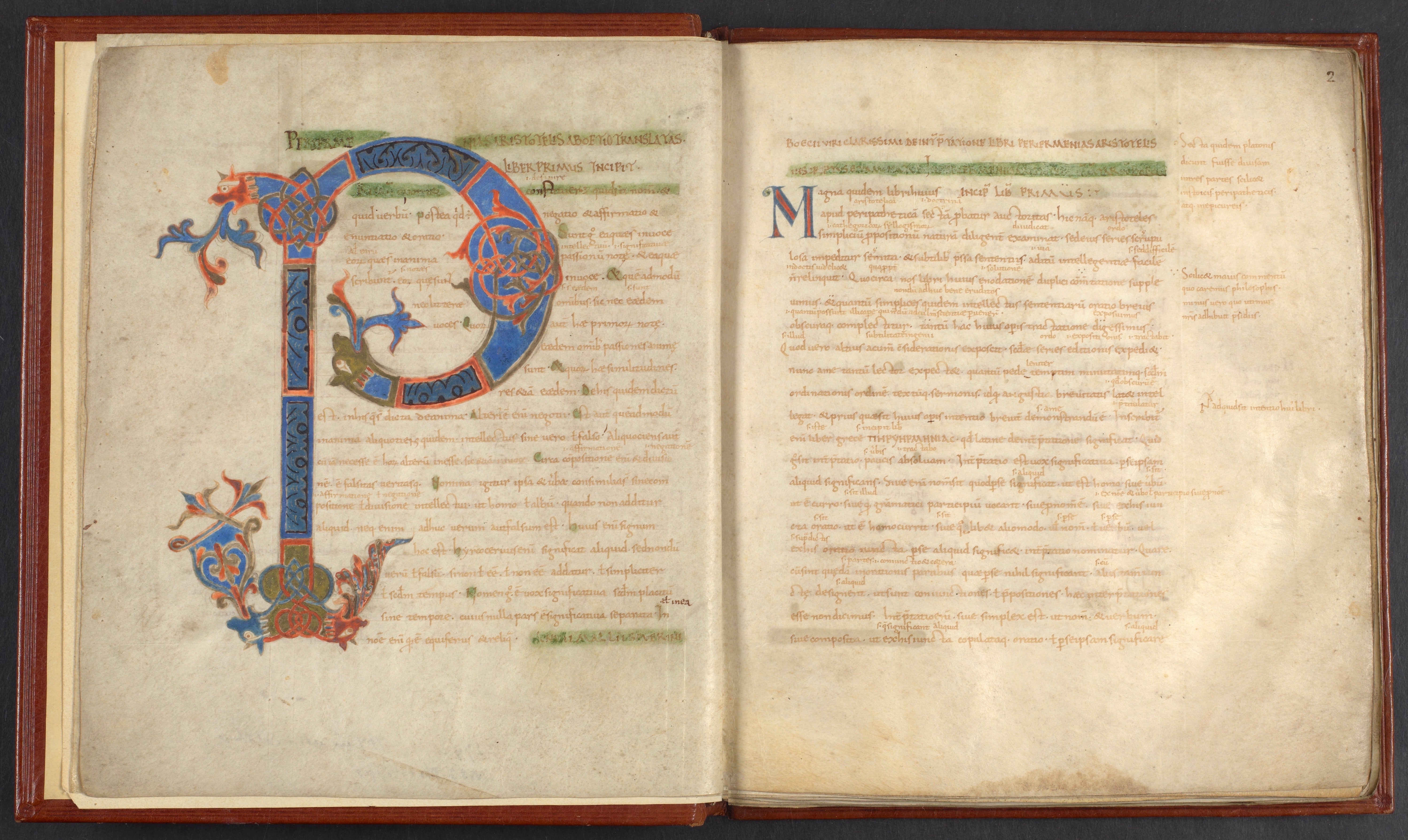 Page of an illuminated manuscript with an elaborate 'P' on the left-hand page.