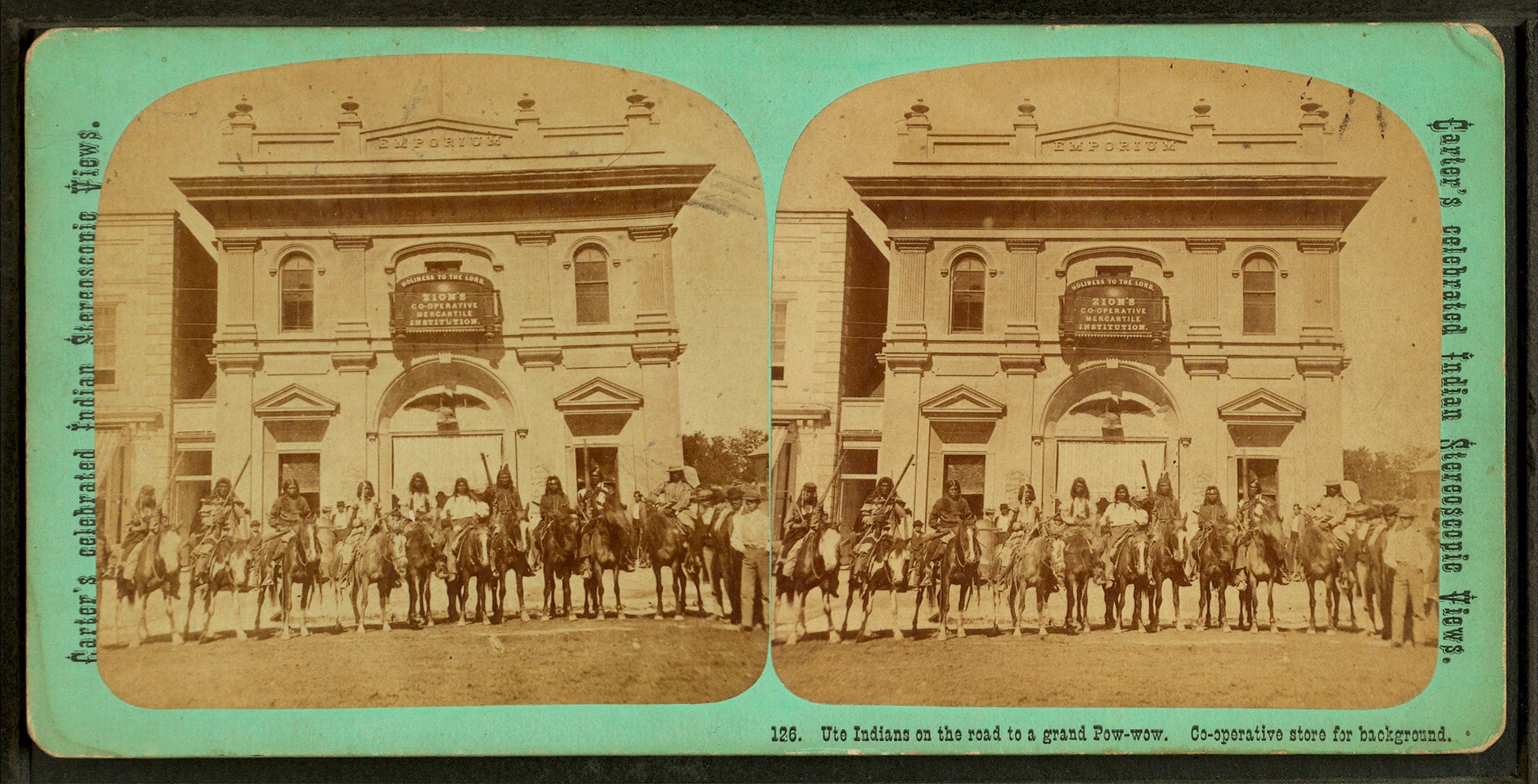 Sepia-toned stereograph showing a group of people on horseback in front of a storefront.