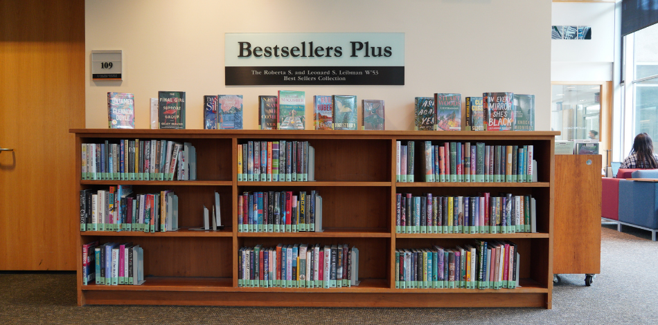 A bookshelf at the Van Pelt-Dietrich Library Center labelled "Bestsellers Plus".