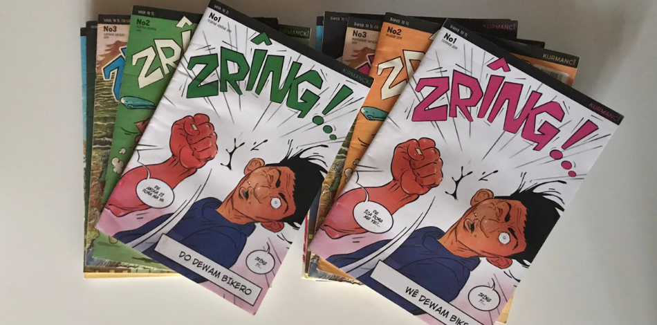 A stack of issues of the comic book 'Zring!' showing a colorful cartoon of a person getting punched in the face.