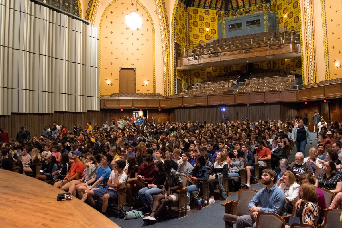 Students sitting in the Irvine Auditorium. 